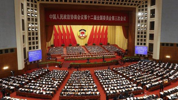 Delegates and officials conduct the closing of the Third Session of the 12th National Committee of the Chinese People's Political Consultative Conference at the Great Hall of the People in Beijing, China, on 13 March 2015