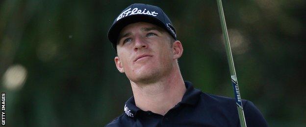 Morgann Hoffmann watches his tee shot on the short 17th on Friday