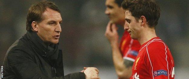 Liverpool manager Brendan Rodgers and midfielder Joe Allen