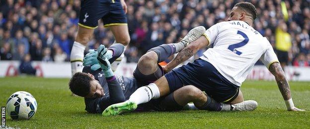 Tottenham keeper Hugo Lloris was carried off on a stretcher after colliding with team-mate Kyle Walker