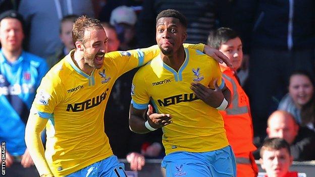 Wilfried Zaha celebrates with Glenn Murray