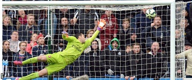 David Opsina watches Remy Cabella's shot curl wide but he denied the French winger late on