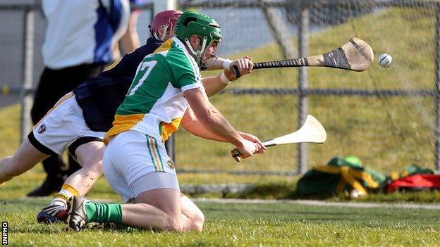 Antrim goalkeeper Chrissy O'Connell denies Offaly forward Joe Bergin