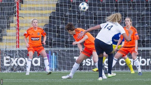 Paris Saint-Germain's Kheira Hamraoui (14) finishes a well worked corner