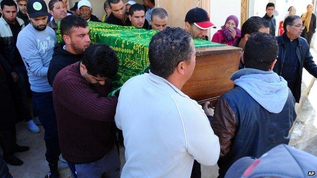 The coffin of gunman Yassine Laabidi is carried to the Jallez Cemetery in Tunis at his funeral on 22 March 2015