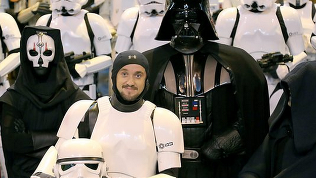 Harry Potter star Tom Felton with 'Darth Vader' and other Star Wars fans in costume