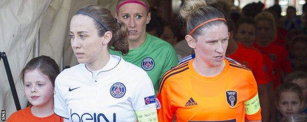 PSG captain Sabrina Delannoy and Glasgow City counterpart Leanne Ross lead their teams out