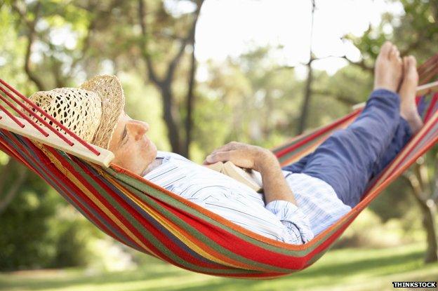 Man asleep in a hammock