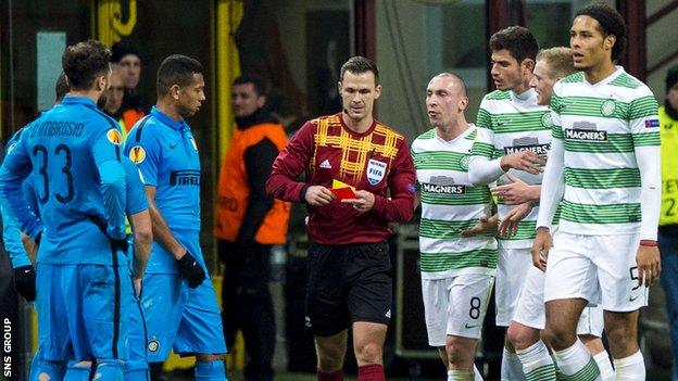 Celtic's Virgil Van Dijk is sent off after a second yellow from referee Ivan Kruzliak