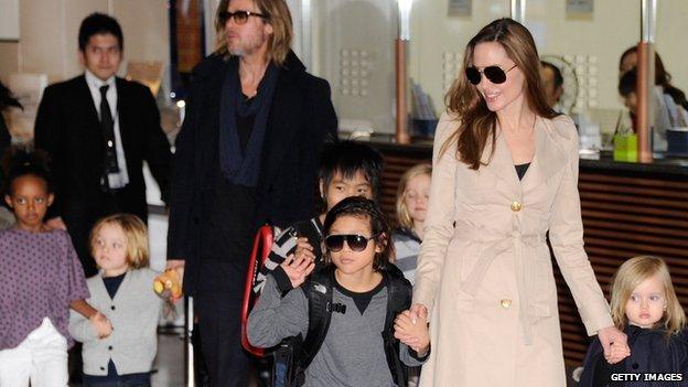 Brad Pitt and Angelina Jolie with their children