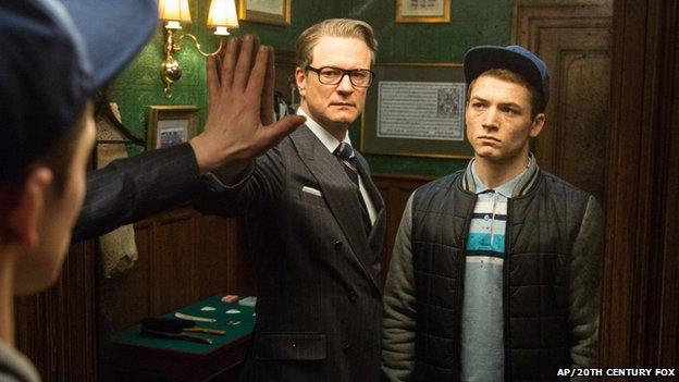 A still of actors Colin Firth and Taron Egerton in the film Kingsmen