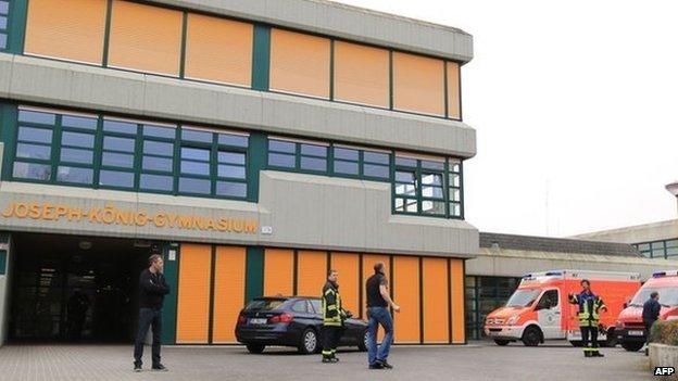 Members of the emergency services are present at the Joseph-Koenig secondary school in Haltern am See, western Germany on 24 March 2015