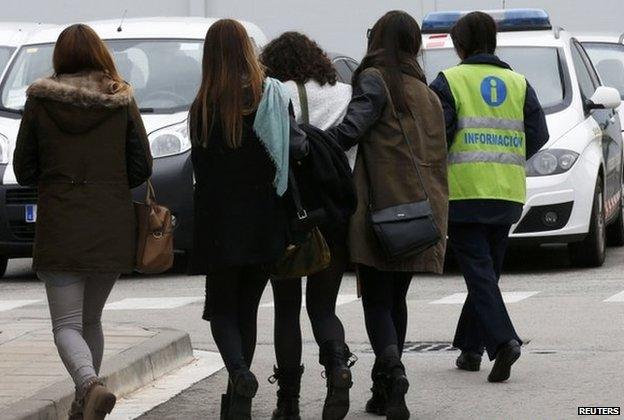 Family members of those killed in Germanwings plane crash as they arrive at Barcelona's El Prat airport 24 March 2015