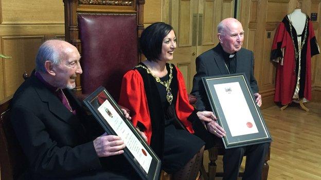 The two retired bishops received the freedom of the city in 2015