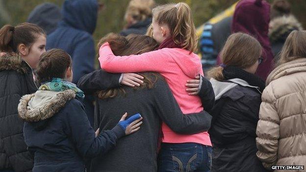 HALTERN, GERMANY - 25 MARCH: Pupils gather at the Joseph-Koenig-Gymnasium high school to pay tribute to 16 students and two teachers from the school who were on Germanwings flight 4U9525