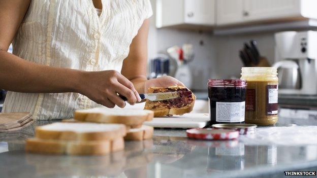 Woman making sandwiches