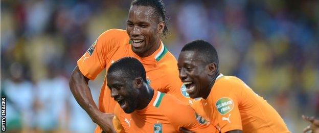 Didier Drogba, Yaya Toure and Max Gradel celebrate