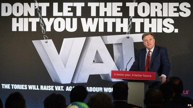 Ed Balls launches a Labour campaign poster warning of the prospect of a VAT rise under the Conservatives