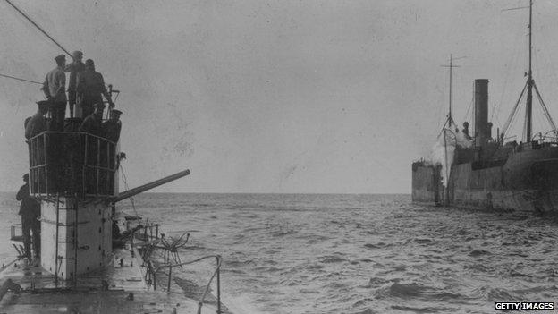 A U-boat opens fire with a deck cannon, upon an allied merchant ship