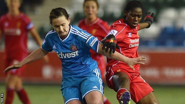 Liverpool's Asisat Oshoala (right) and Sarah McFadden of Sunderland