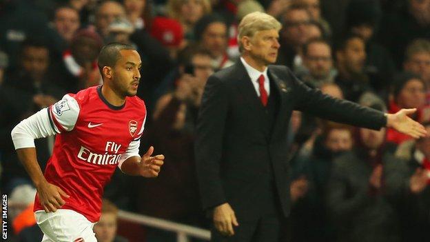 Arsenal winger Theo Walcott (left) and manager Arsene Wenger