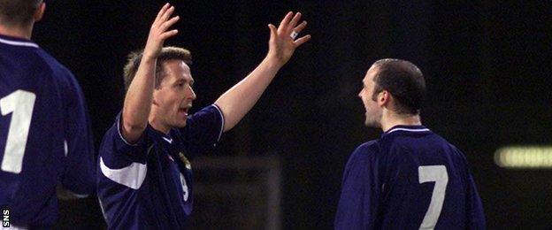 Billy Dodds (left) celebrates scoring in a 4-0 win over San Marino in 2001