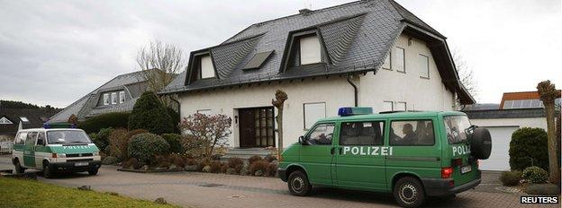 Police vans outside Andreas Lubitz's home on 27 March