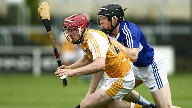 Antrim's PJ O'Connell and Laois's Brian Stapleton