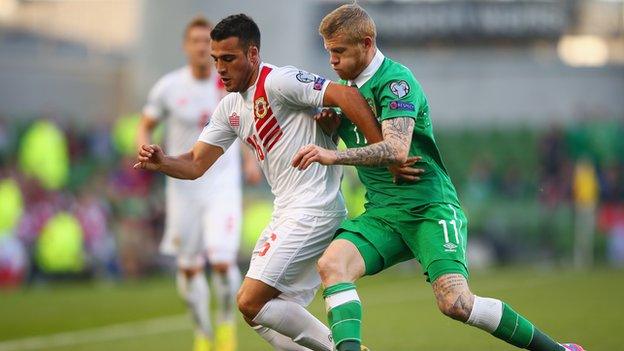 Brian Perez of Gibraltar (left) and James McClean of Republic of Ireland