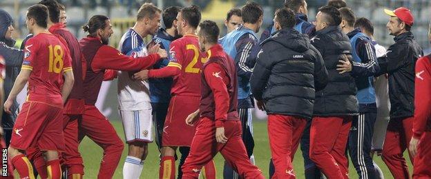 Montenegro and Russia players brawl during their Euro 2016 qualifier