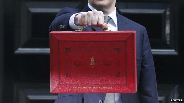 George Osborne holds up Budget case as he stands outside Number 11 Downing Street