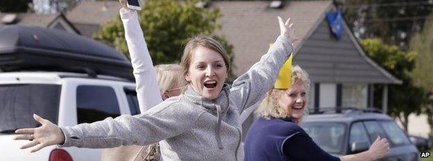 Supporters of Amanda Knox leave her mother's home looking happy