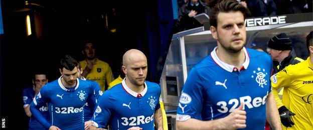 Rangers players running out the tunnel at Ibrox