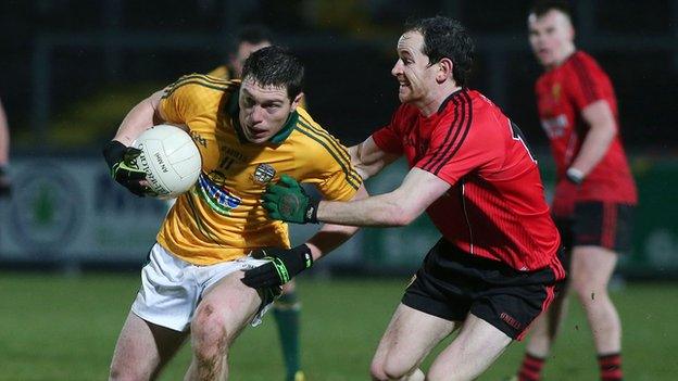 Padraic Harnan is challenged by Down's Conall McGovern at Pairc Esler