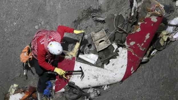 Workers at crash site, 29 March