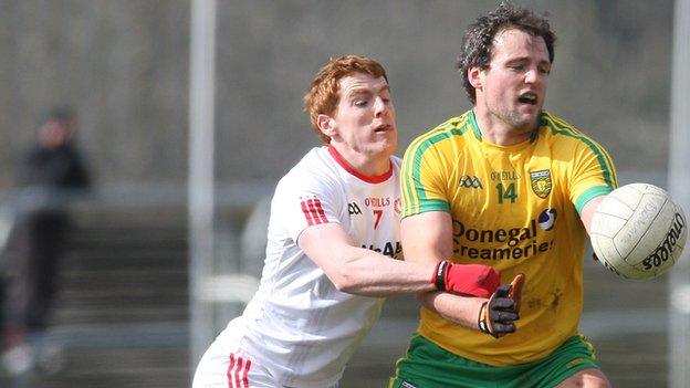 Michael Murphy battles with Peter Harte at Ballybofey