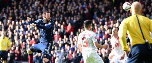 Steven Fletcher scored the first of his hat-trick to restore Scotland's lead