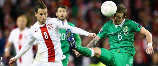 Poland's Grzegorz Krychowiak and the Republic of Ireland's Glenn Whelan