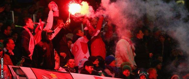 The match started with smoke floating across the Aviva Stadium pitch after Poland fans let off flares