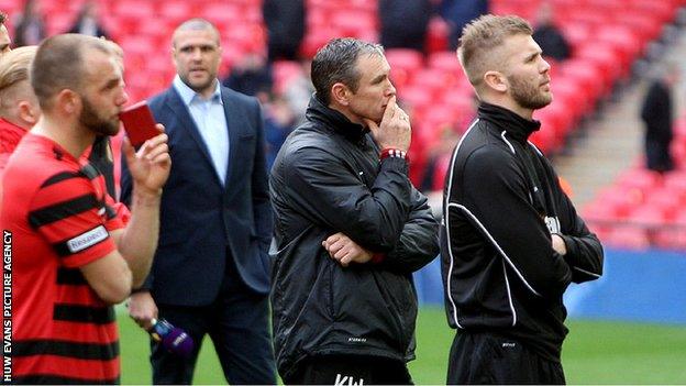 Kevin Wilkin and Wrexham players after losing the FA Trophy final against North Ferriby