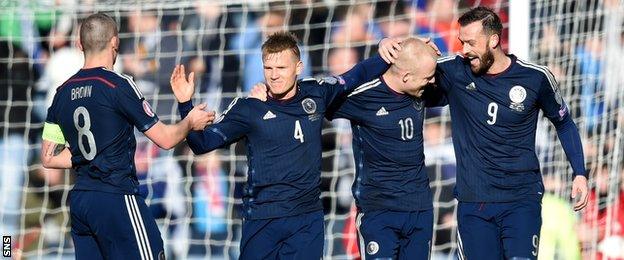 Scotland's Steven Naismith (2nd right) celebrates his goal with team-mates