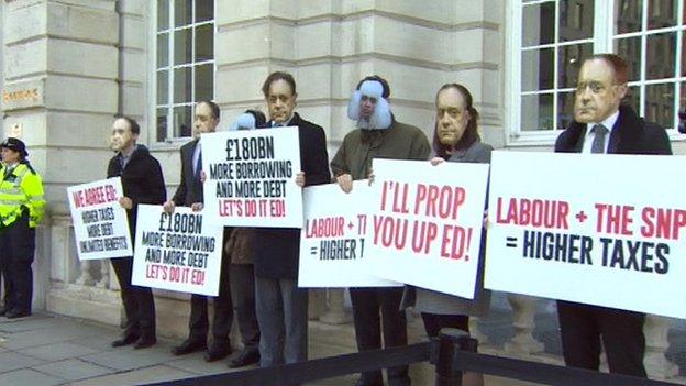 Protesters with Alex Salmond masks