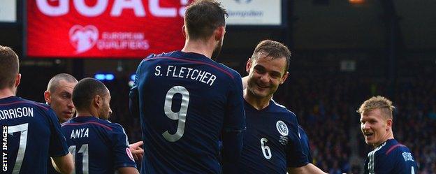 Steven Fletcher and Shaun Maloney celebrate against Gibraltar