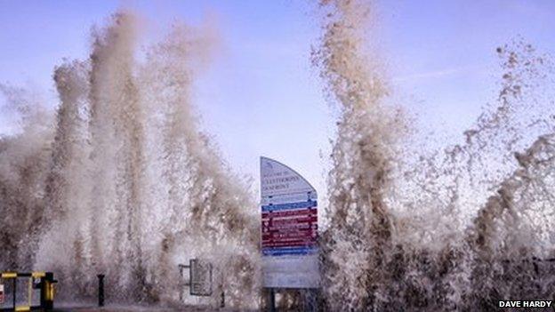 Picture taken at the seafront in Cleethorpes as waves hit (smash against) the seafront during stormy weather