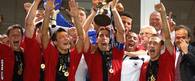 Mesut Ozil and Sami Khedira celebrate winning the 2009 Under-21s European Championship