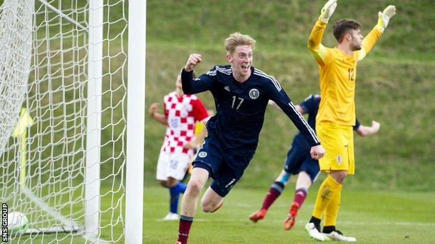 Scotland U19s' Oliver McBurnie celebrates levelling the score against Croatia