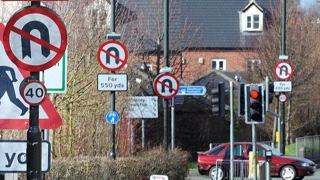 U-turn signs