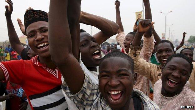 Supporters of the presidential candidate Muhammadu Buhari and his All Progressive Congress (APC) party celebrate in Kano, 31 March 2015