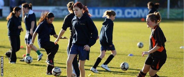 A group of girls from Staines took part in a coaching session by Chelsea Ladies FC