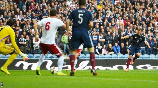 Shaun Maloney's deflected shot gave Scotland a 1-0 win over Georgia at Ibrox